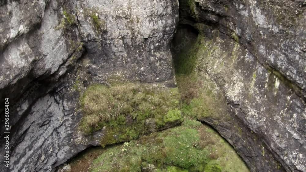 Sumgan-Kutuk karst cave. Descent cavers in the cave. Aerial view.