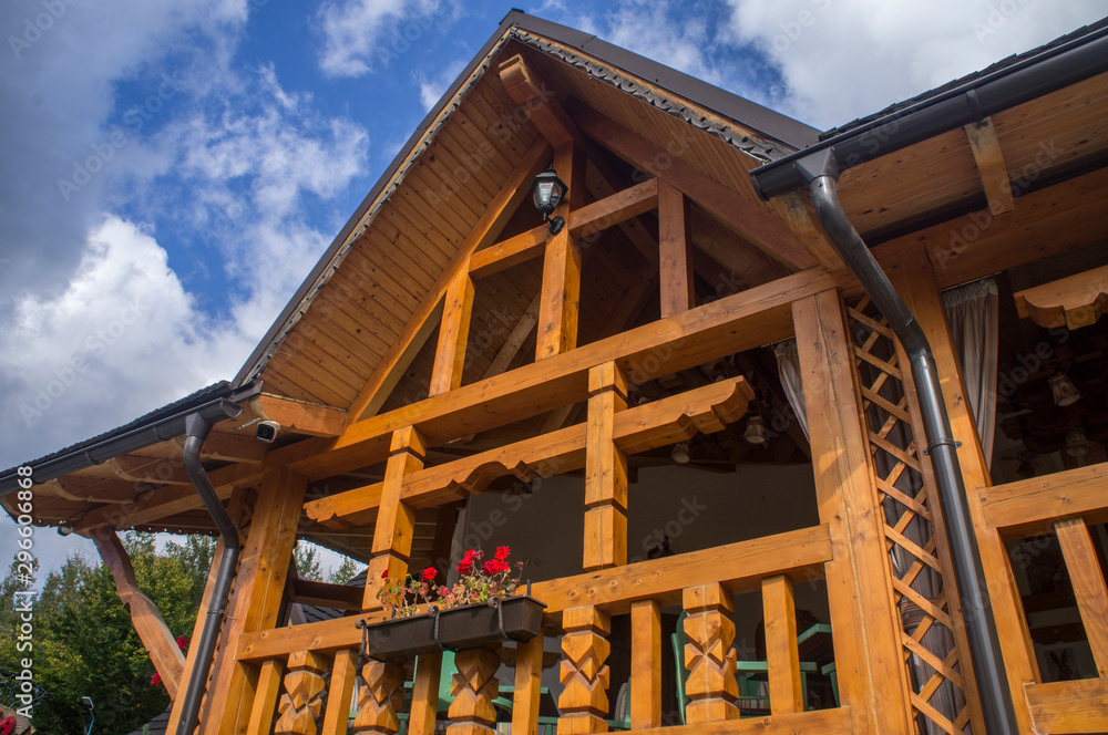 Fototapeta premium Wooden building cottage made of timber.