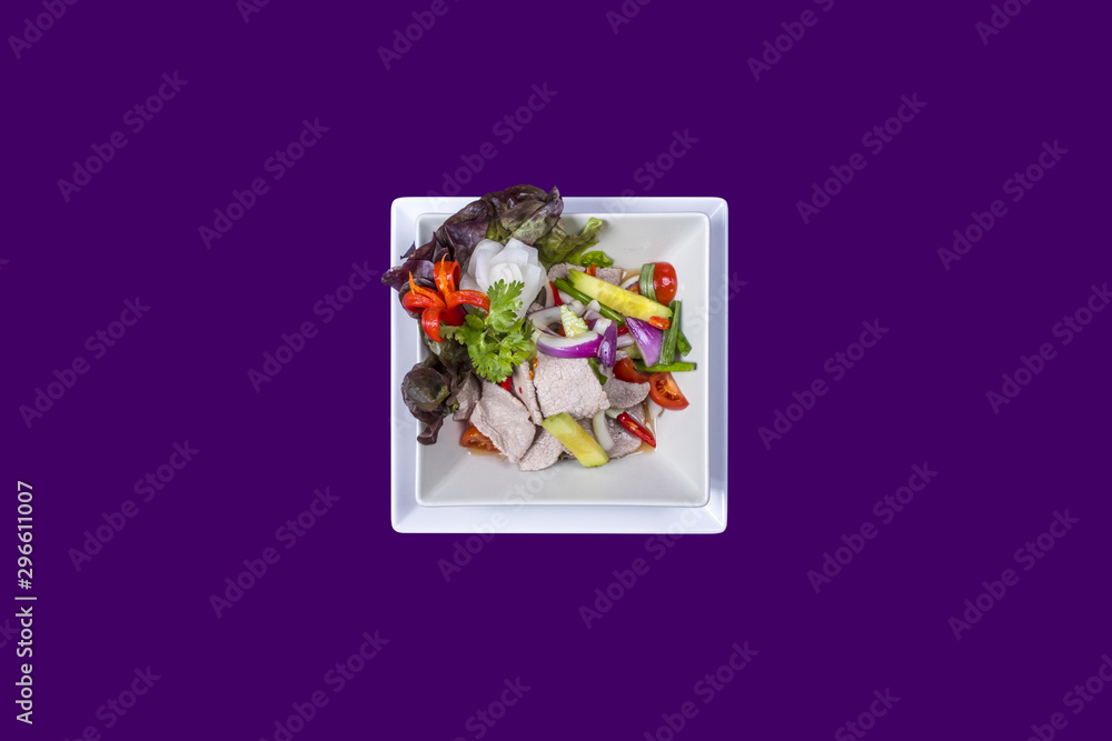 Fototapeta premium Asian Thai food on white plates with purple background with copy space