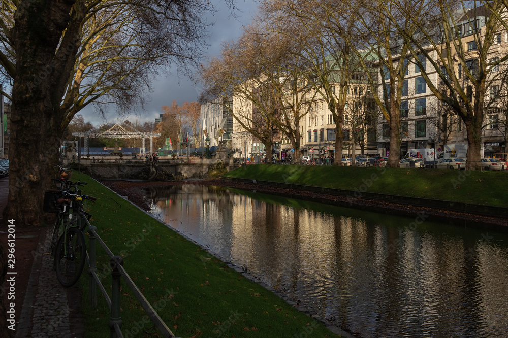view of the reflection of houses and trees in the water of a canal Dusseldorf, Germany December 10, 2018 view of the reflection of houses and trees in the water of a canal Dusseldorf, Germany December 10, 2018