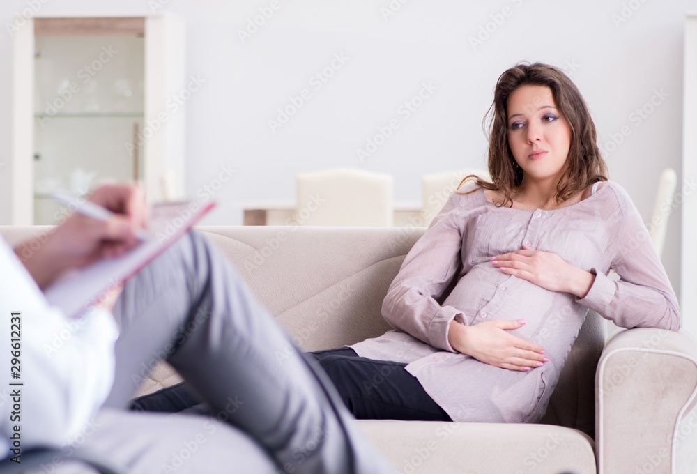 The pregnant woman visiting psychologist doctor