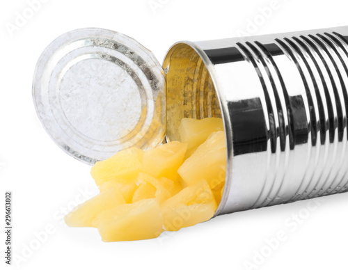 Tin with delicious sweet canned pineapple on white background