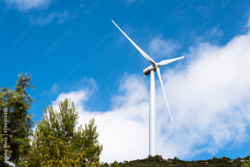 Windmills for the production of electric energy. Wind farm of renewable, alternative and sustainable energy, province of Barcelona Windmills for the production of electric energy. Wind farm of renewable, alternative and sustainable energy, province of Barcelona