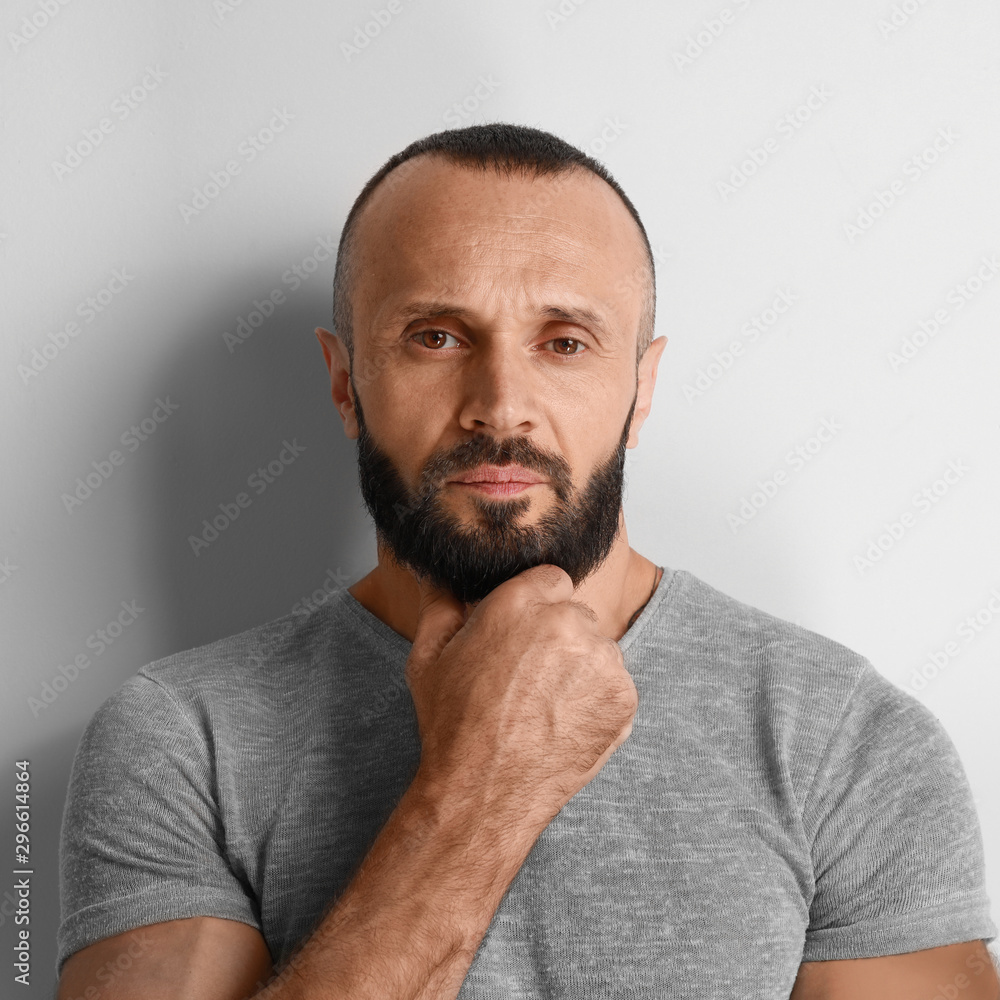 Fototapeta premium Portrait of handsome man on white background