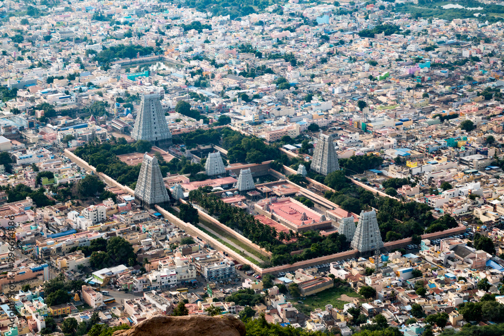 Overall view of the city of Tiruvannamalai and the Annamalaiyar temple from the Arunchalahill sacred mountain hiking on a summer day, Tiruvannamalai, Tamil Nadu, India 2019