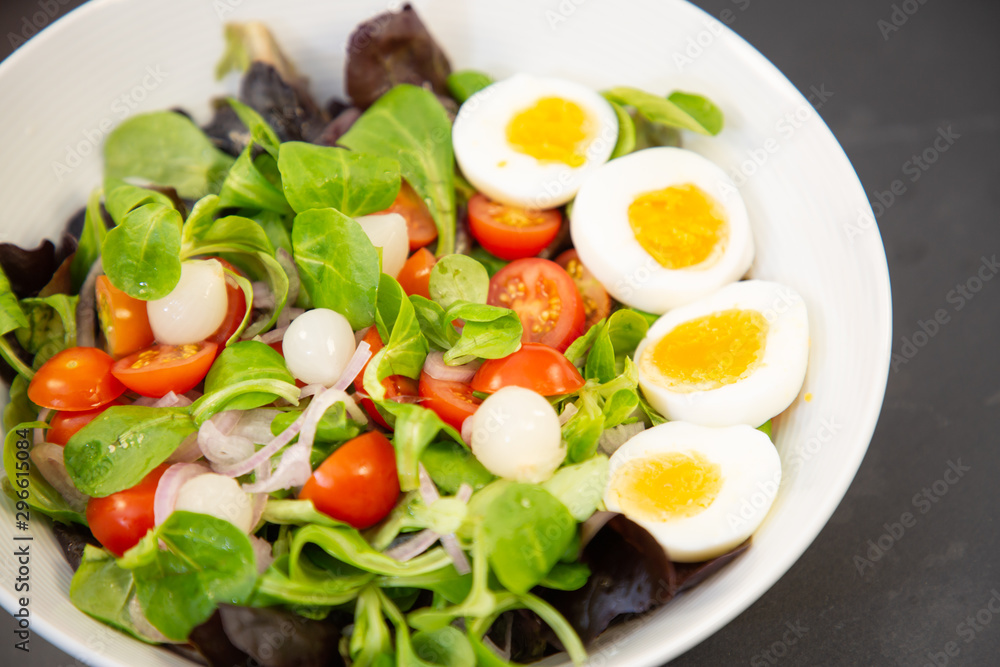 Salad egg mixed with spinach tomatoes, meal food delicious diet for healthy. Salad egg mixed with spinach tomatoes, meal food delicious diet for healthy.
