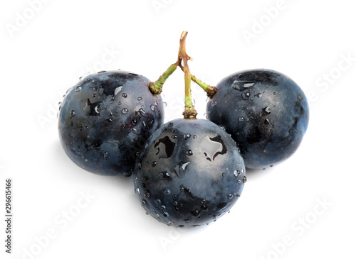 Fresh ripe juicy black grapes isolated on white