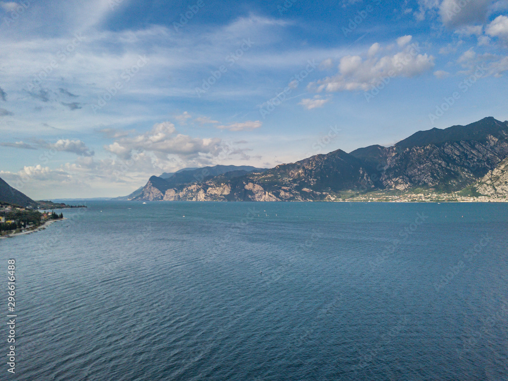 Aerial view of Lake Garda in Italy, Europe. Panorama view of water and mountains. Aerial view of Lake Garda in Italy, Europe. Panorama view of water and mountains.