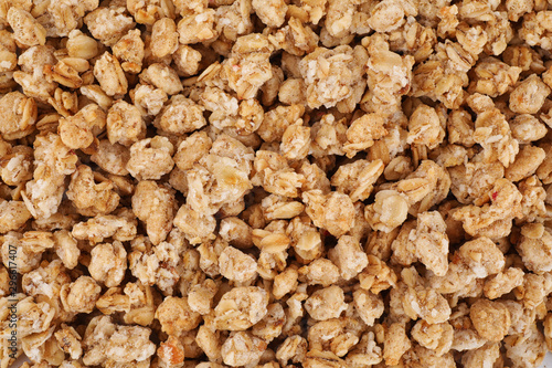 Healthy crunchy granola as background, top view