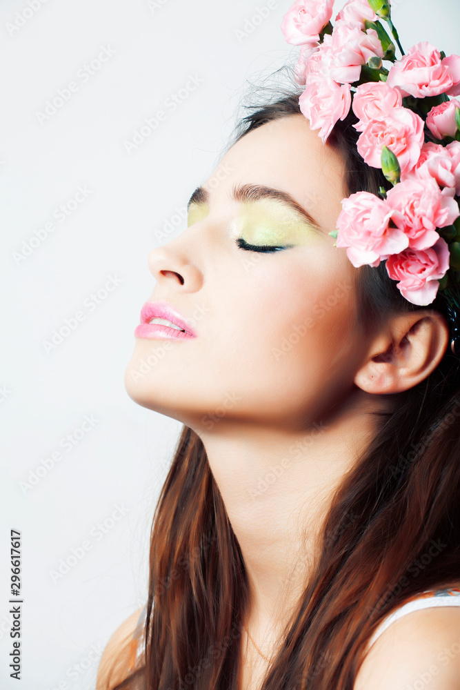young pretty brunette woman with pink flowers and manicure posing cheerful isolated on white background closeup young pretty brunette woman with pink flowers and manicure posing cheerful isolated on white background closeup