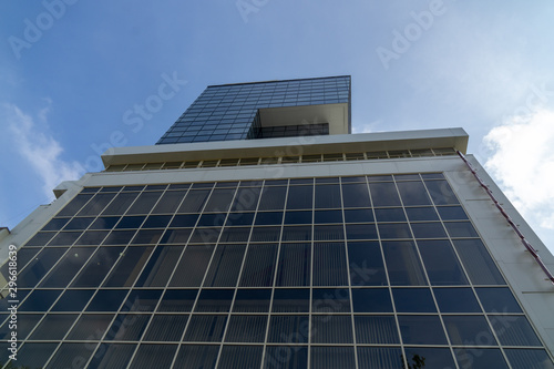 underside panoramic and perspective view to steel blue glass high rise building skyscrapers, business concept of successful industrial architecture © Igor Syrbu