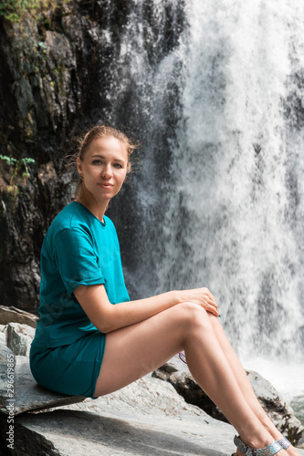 Woman at Korbu Waterfall on...