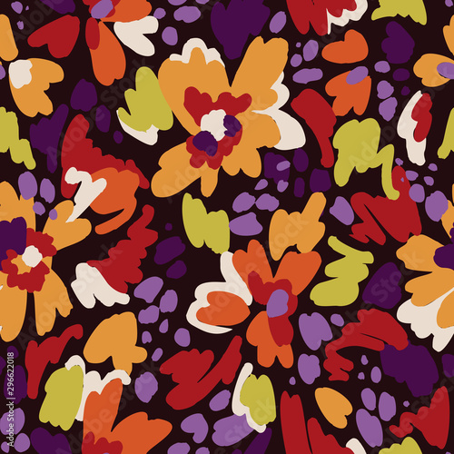 Floral seamless pattern in vintage style. Bright abstract flowers. Flower meadow. Multicolor brush strokes and brush spots. Simple botanical background. Flat design. Good for fashion, textile, fabric.