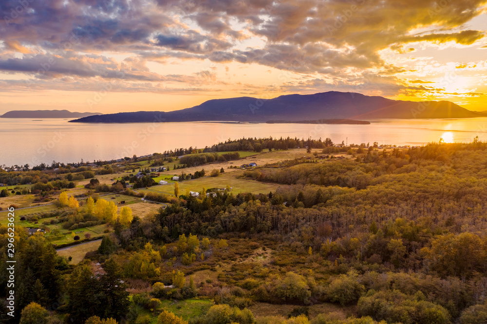 Sunset Aerial View of Rural Lummi Island, Washington. Located in the Puget Sound area of Washington state this rural island offers a peaceful retreat and boasts the famous award winning Willows Inn.