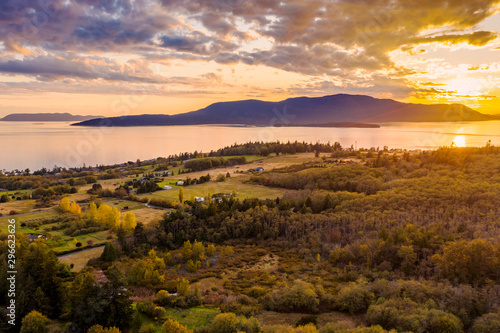 Sunset Aerial View of Rural Lummi Island, Washington. Located in the Puget Sound area of Washington state this rural island offers a peaceful retreat and boasts the famous award winning Willows Inn.