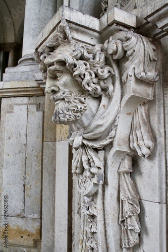 greek roman pillar with bust statue
