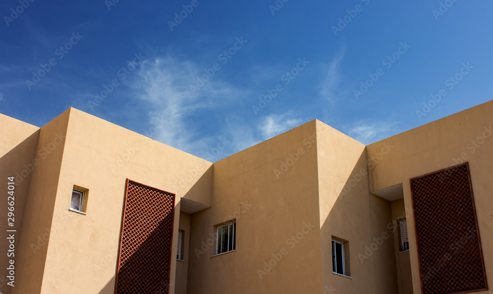 exterior facade geometric shapes of suburban concrete living building walls 