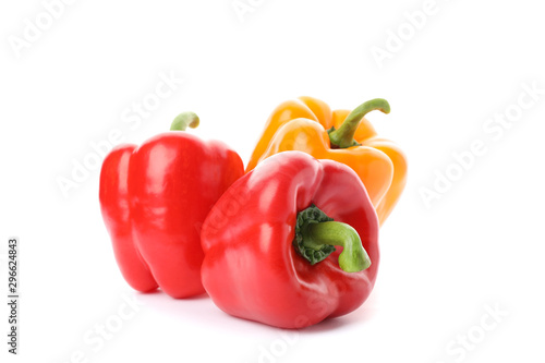 Yellow and red bell peppers isolated on white background