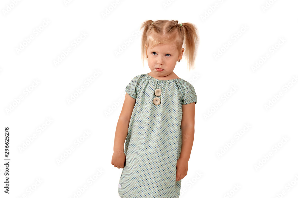 Studio portrait of a teenager beautiful girl. Emotions of a little girl on a white isolated background. Studio portrait of a teenager beautiful girl. Emotions of a little girl on a white isolated background.