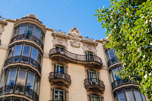 Photography Beautiful Catalan architecture on the facade of Spanish apartment building in ce