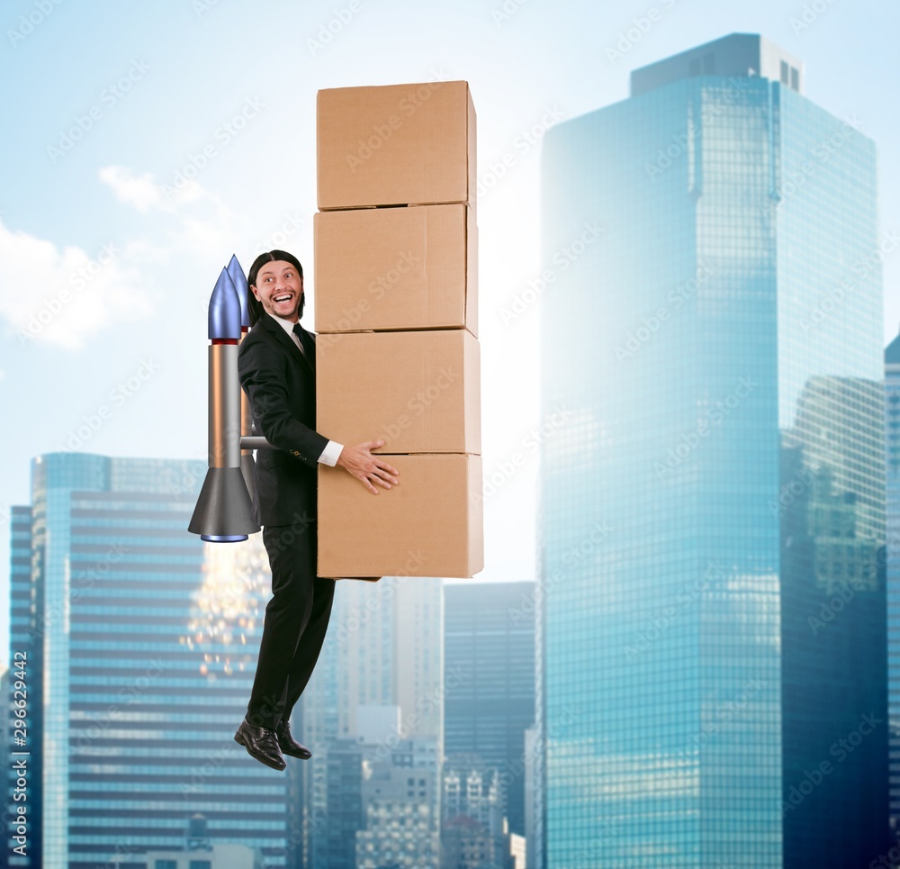Businessman with jetpack delivering boxes globally Stock Photo | Adobe ...
