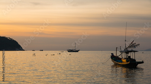 Fishermen boat at sunset near Koh Phangan island, Thailand © Cesare Palma