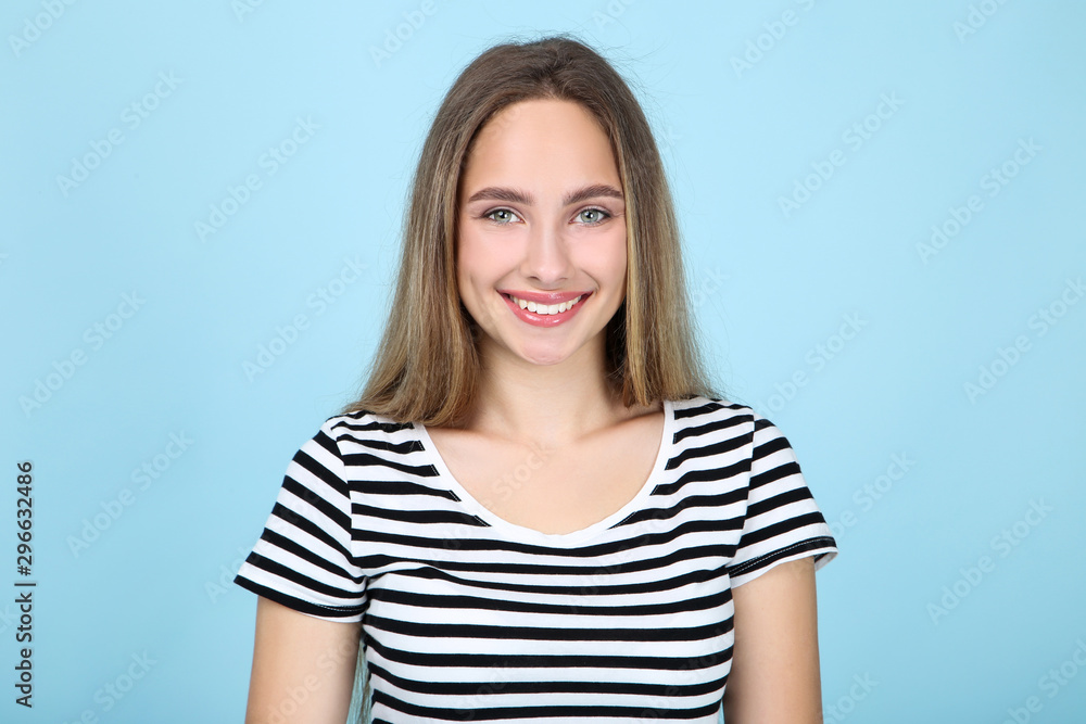 Beautiful young woman on blue background Beautiful young woman on blue background