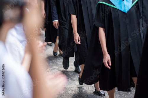 Row of university graduates