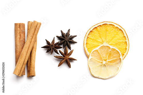 Dried citrus fruits with cinnamon, star anise on white background. Mulled Wine Ingredients