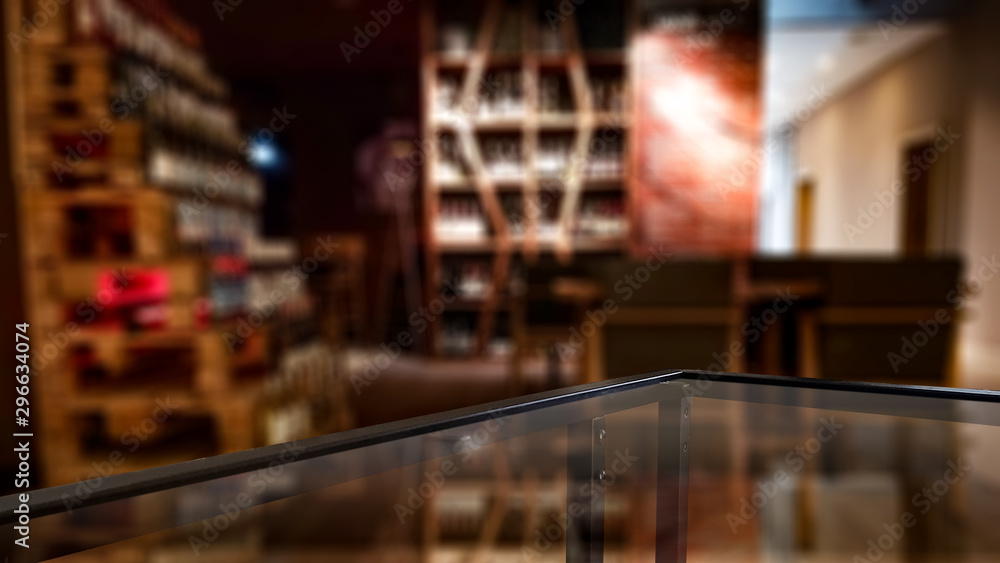 Fototapeta premium Table background and blurred bar interior view. Empty space for your decoration and an advertising product.