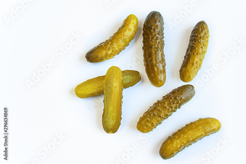 Pickled cucumbers on a white background