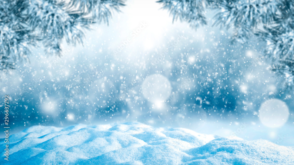 Snowy winter background with space  for products and decorations. Sunshine winter landscape.