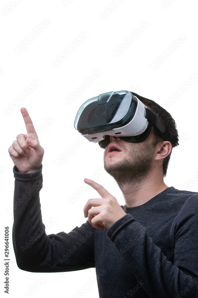 Man is using virtual reality headset on white isolated background. Man is using virtual reality headset on white isolated background.