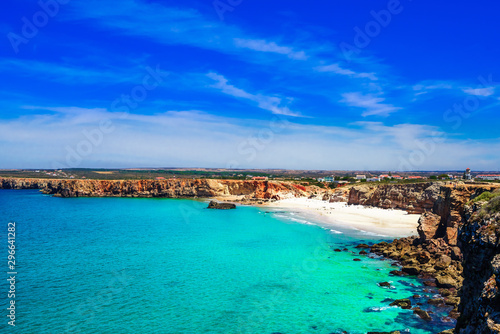View on coastline with ocean and beach next to Sagres at Algarve in Portugal photo