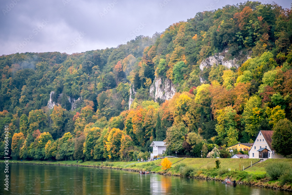 Bright autumn. Yellow and orange trees. Kelheim, Danube river, Germany autumn