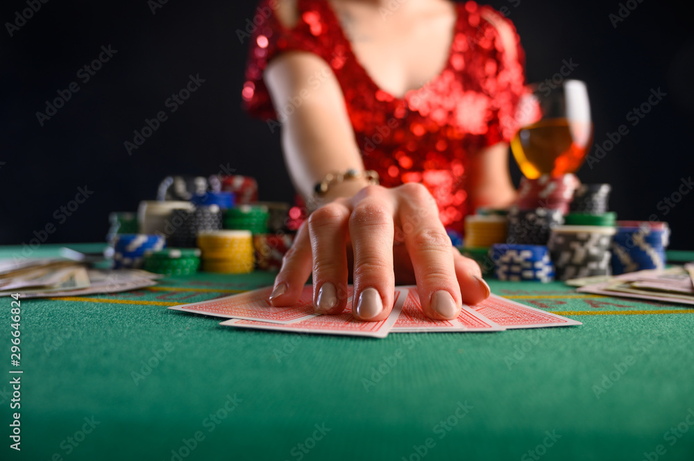 Girl plays cards in a casino, a lot of chips, cards, video. Success and win. Poker Girl plays cards in a casino, a lot of chips, cards, video. Success and win. Poker