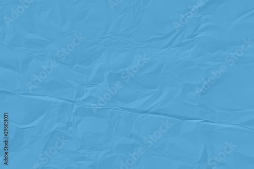 crumpled blue paper background close up