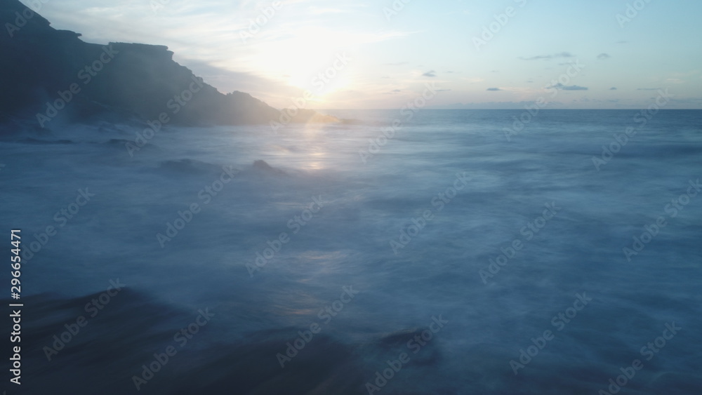 Fototapeta premium sunset from the north coast with the sea and the silk effect