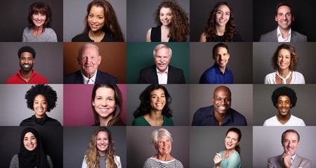 Group of beautiful people in front of a colored background