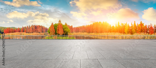 Empty square floor and beautiful colorful forest in autumn