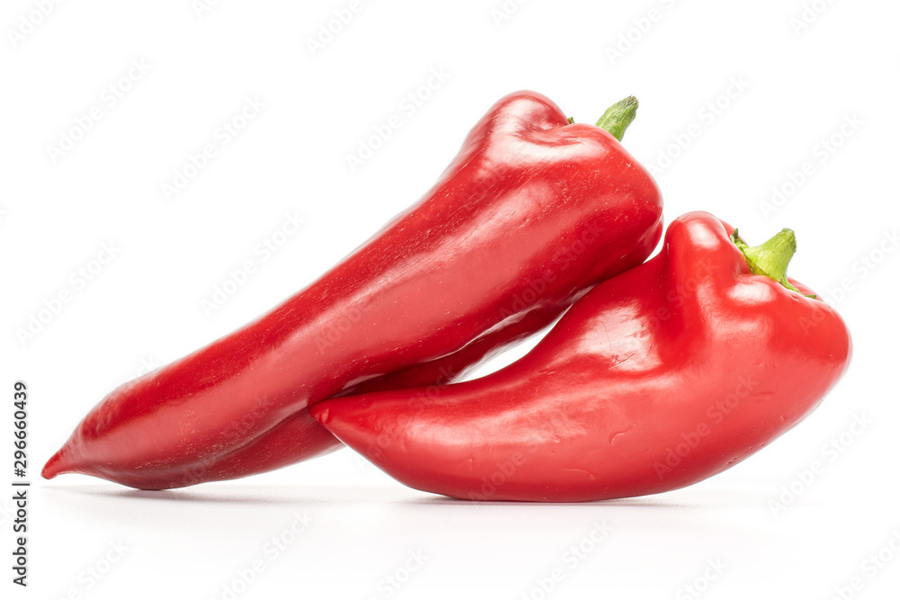 Group of two whole bright sweet red bell pepper isolated on white background