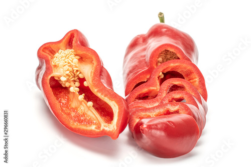 One half lot of slices of sweet red bell pepper isolated on white background