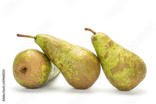 Group of three whole tilted fresh green pear conference isolated on white background