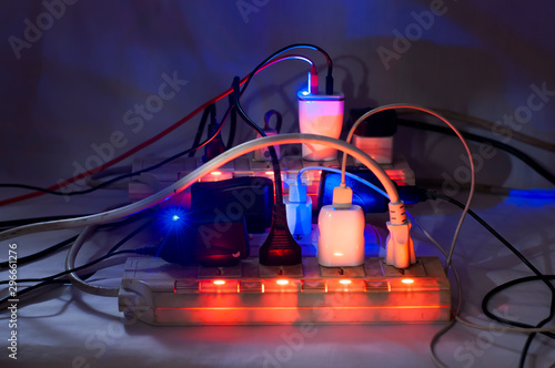 фотографія Multiple Overloaded power boards, Full socket extension cord