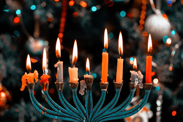 Hanukkah menorah with burning candles