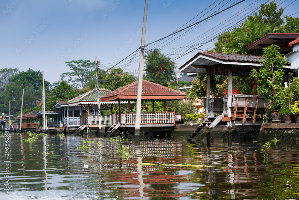 residential boat piers on one of Bangkok's many klongs or canals adjacent to the Chao Phraya River.