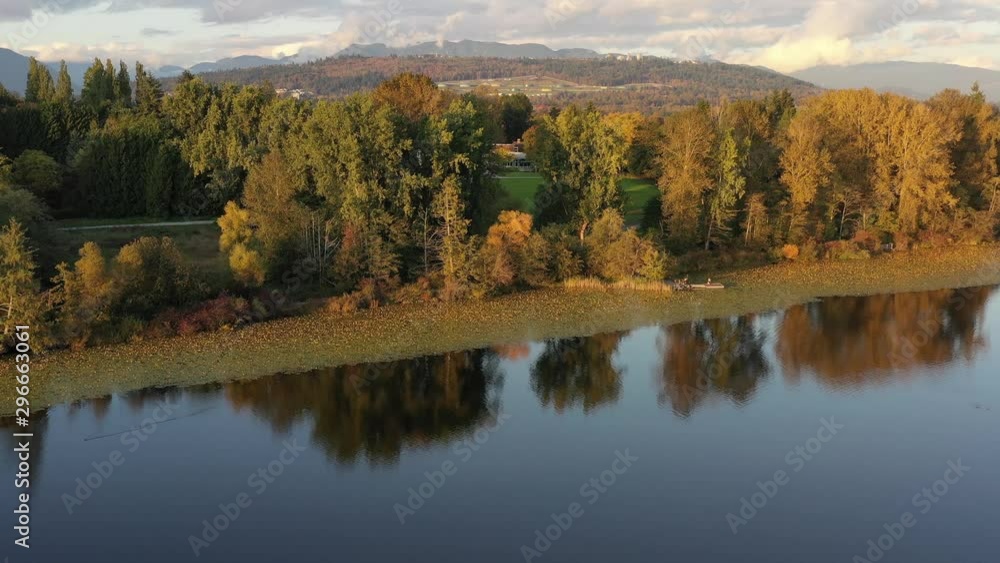 Aerial View at Mountain Lake with Blue Sky in British Columbia, Canada. 4K. Aerial View at Mountain Lake with Blue Sky in British Columbia, Canada. 4K.