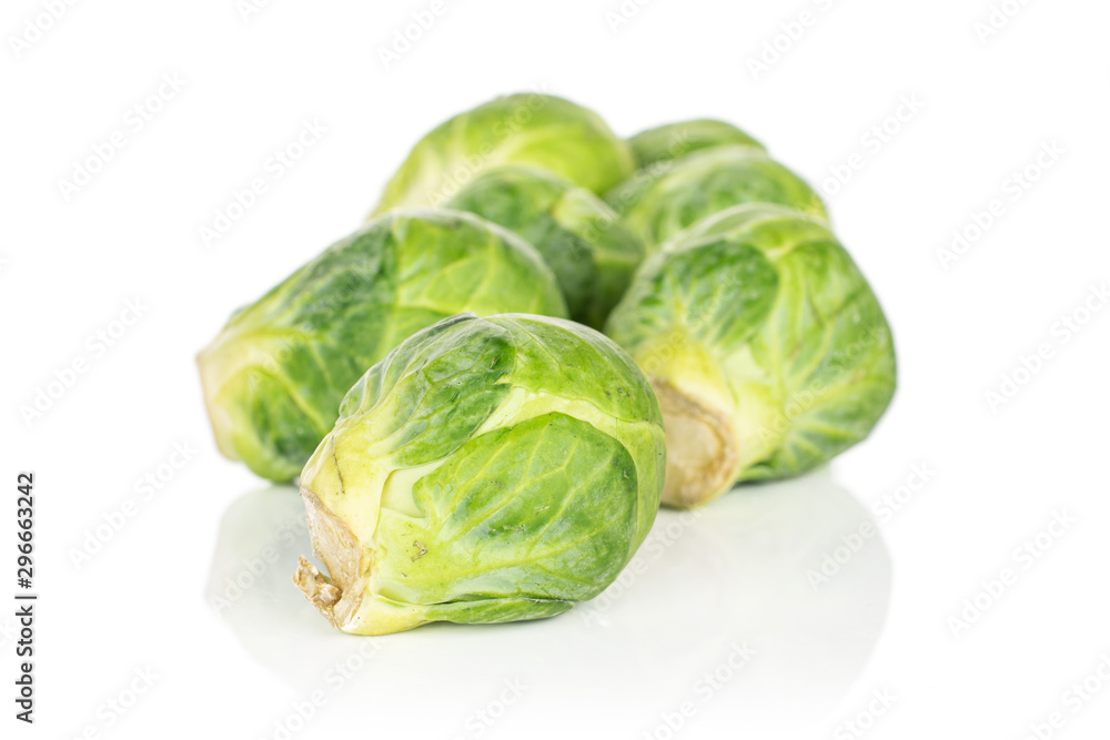Group of seven whole fresh green brussels sprout isolated on white background Group of seven whole fresh green brussels sprout isolated on white background