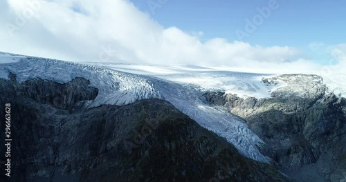 Aerial view of Folgefonna ice cap, tongues of glacier, glacial crevices. Norway. Melting glacier.