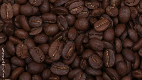 Brown roasted coffee beans background.